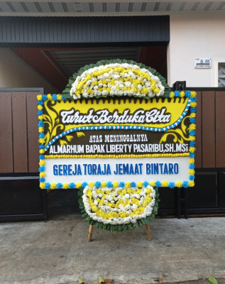 Papan Bunga Duka di Gumay Ulu